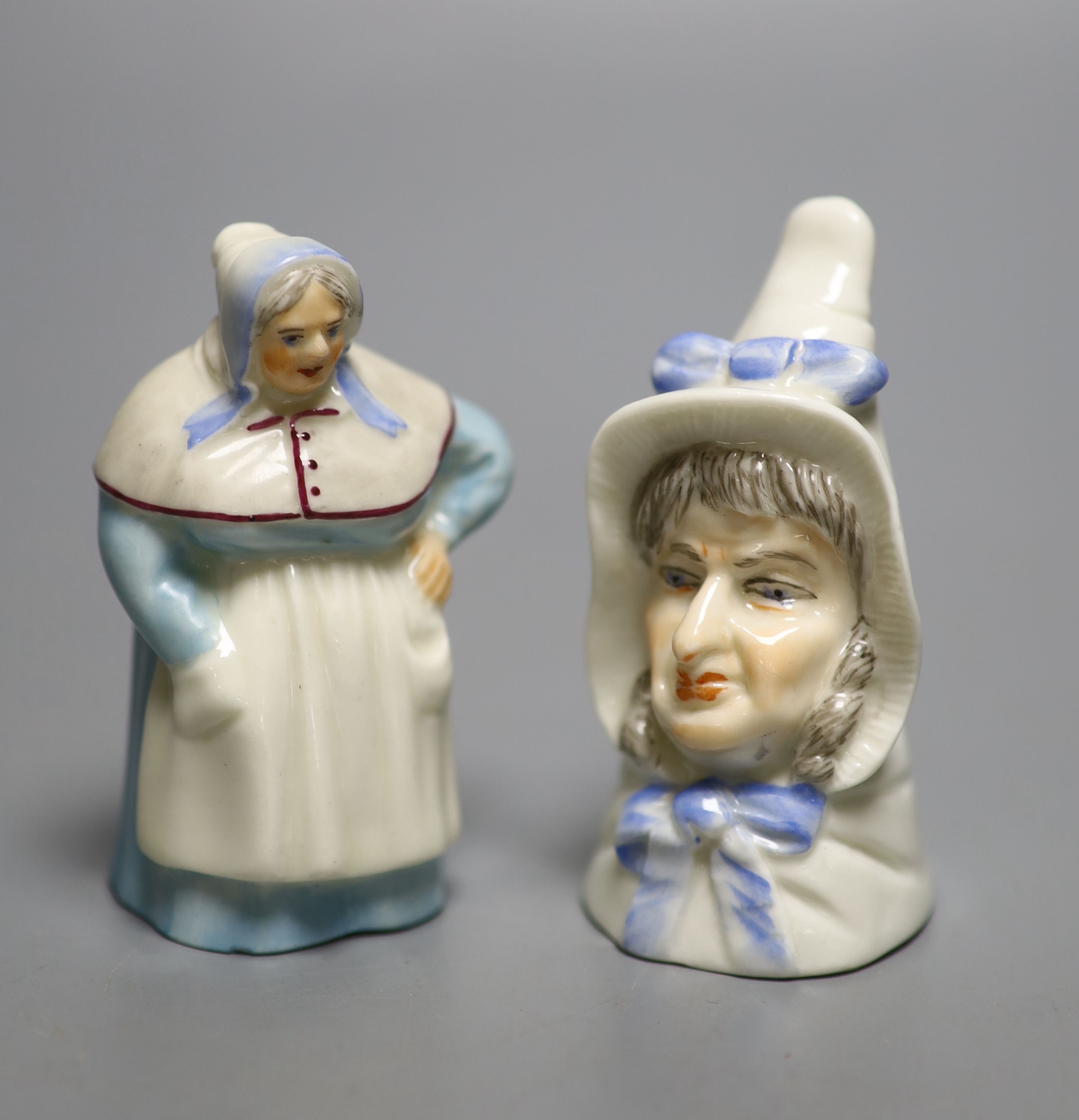 A Royal Worcester candlesnuffer of Mrs Caudle, date mark 1919 and a candlesnuffer of the French Cook, date mark 1925